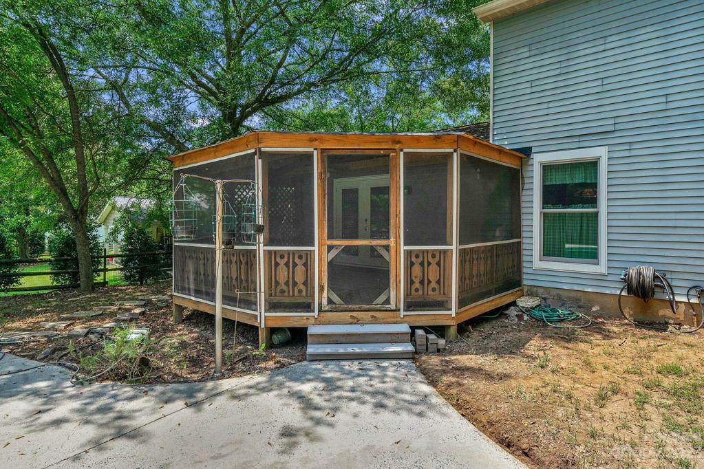 View of screened porch from pool side