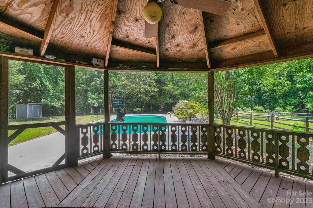 Screened deck overlooking pool