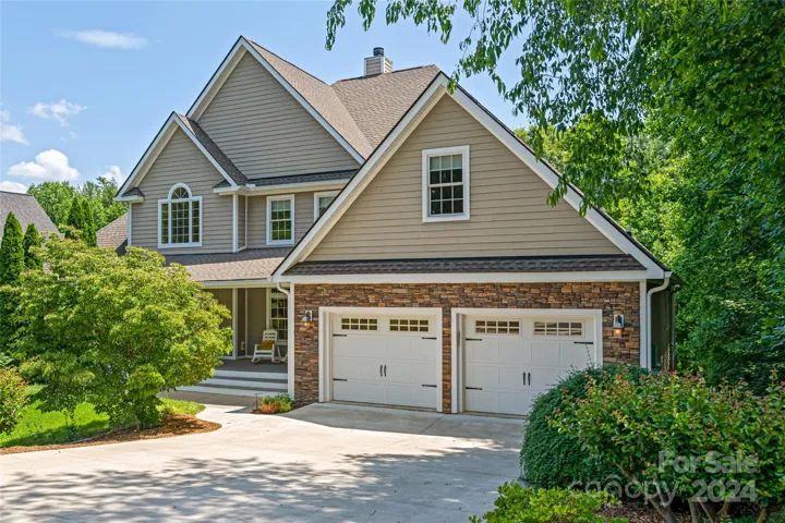 Set on a half acre+ lot with mature landscaping