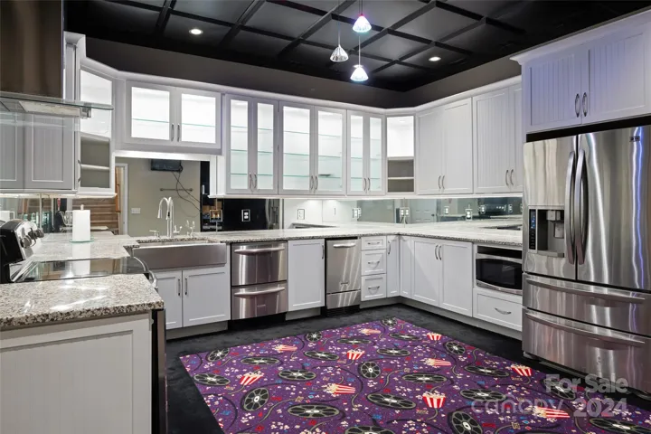 2nd FULL kitchen on the lower level just steps from the theater/recreation room for easy entertaining or multi-generational living