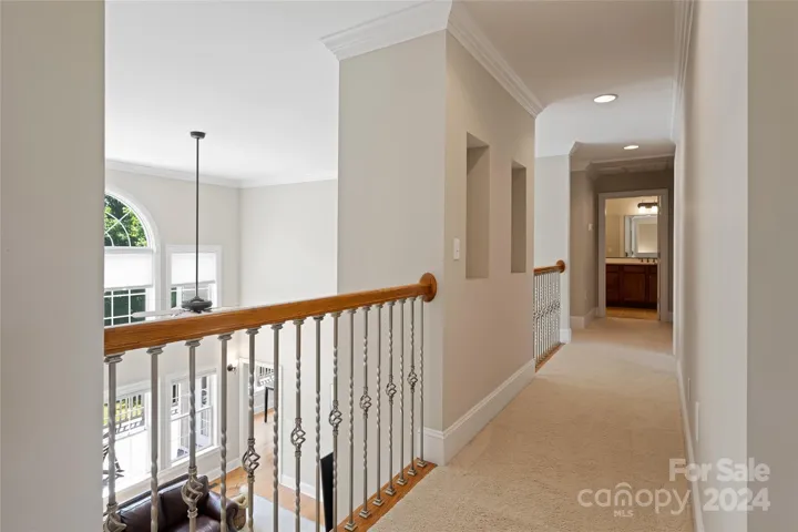 Upstairs hallway and overlook to the great room below
