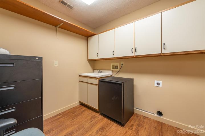 Lower level laundry room.
