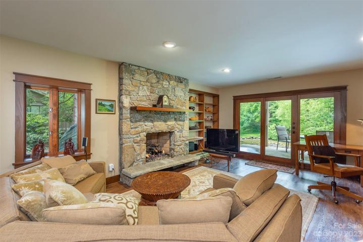 The lower level den has a vented gas fireplace and is a large welcoming space!