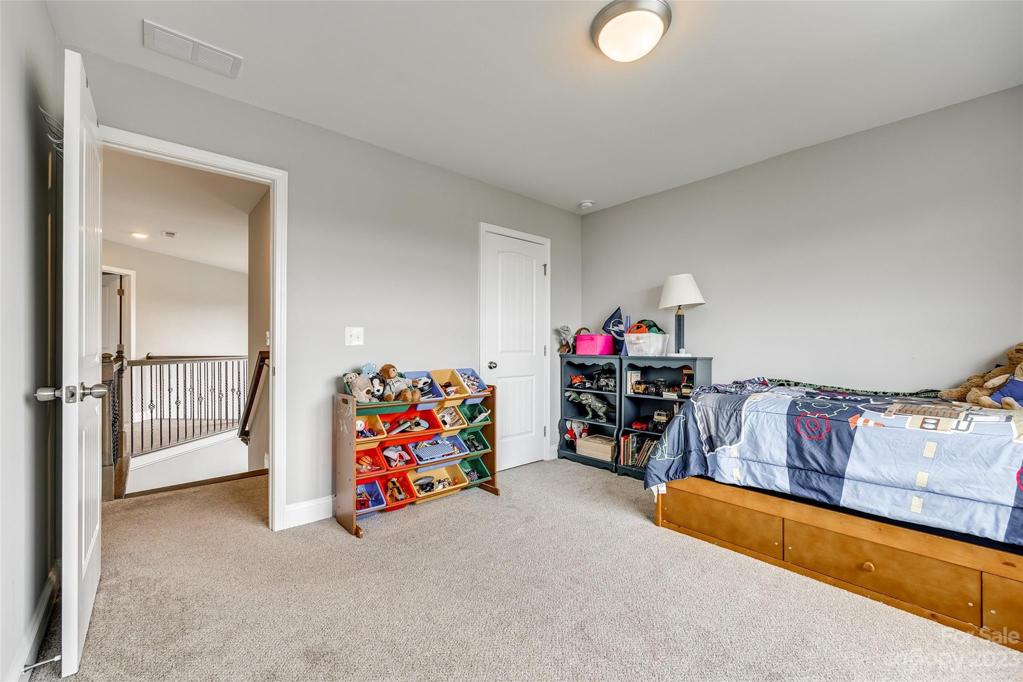 LARGE walk-in attic storage is accessed through this closet