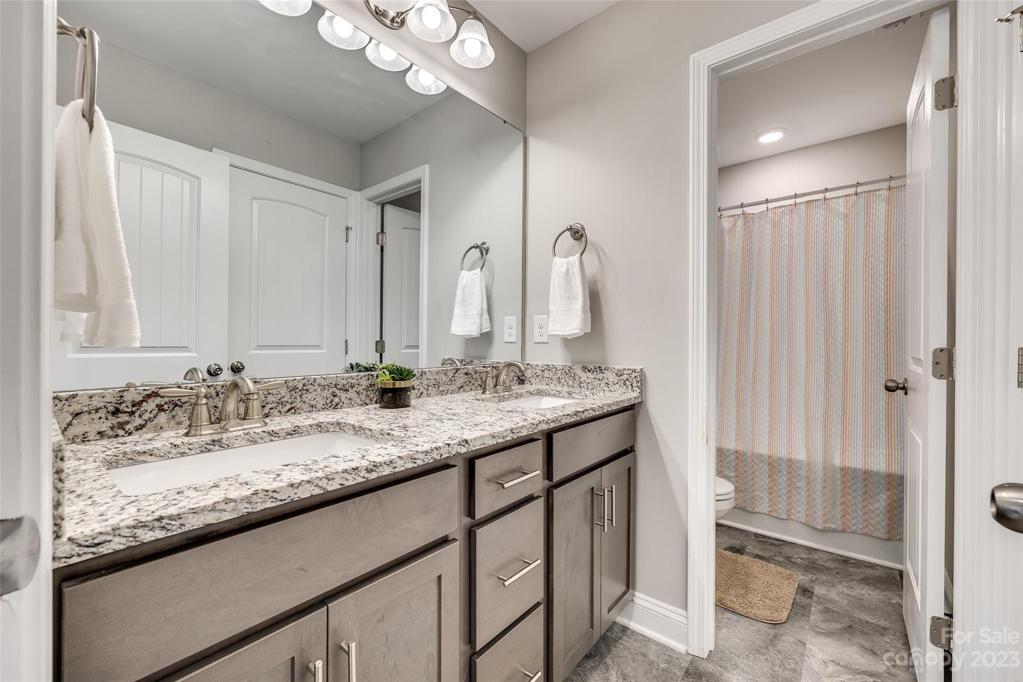 Double vanities in hall bathroom