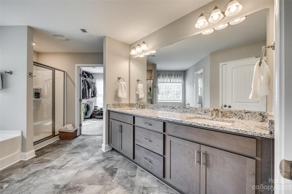 Primary bathroom is spacious and feels new!