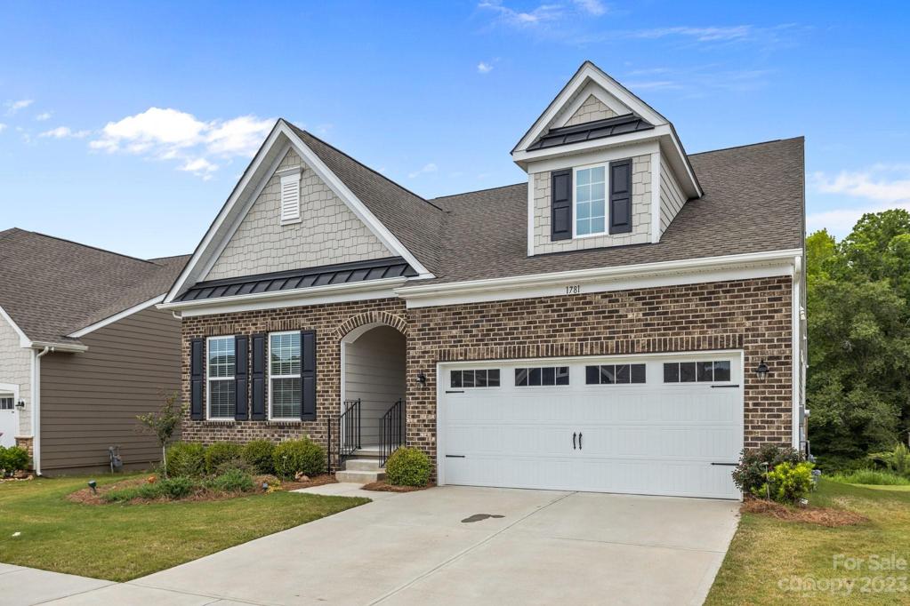 Beautiful new home with a covered front porch.