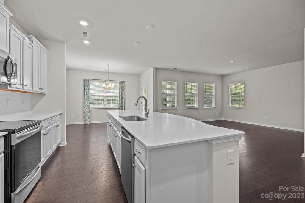Kitchen is open to the great room and breakfast room