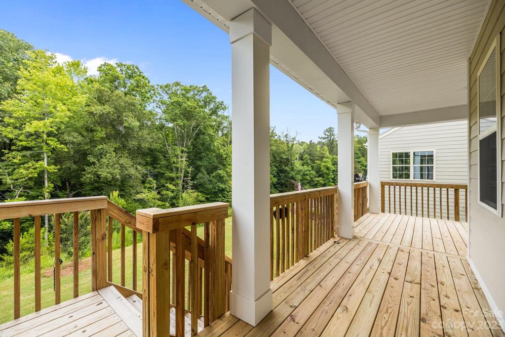 Large covered back porch with access from the primary bedroom or the breakfast room