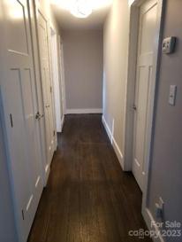 Hallway with refinished wood floor