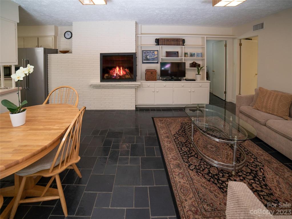 Den with gas fireplace