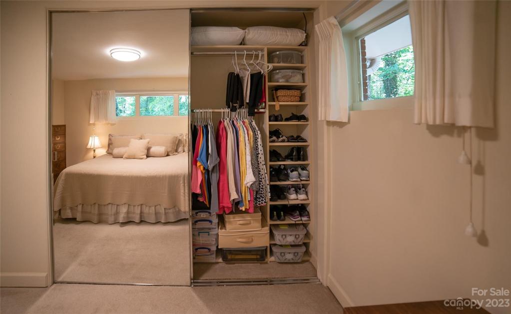 Primary Bedroom with mirrored closet & organizer system