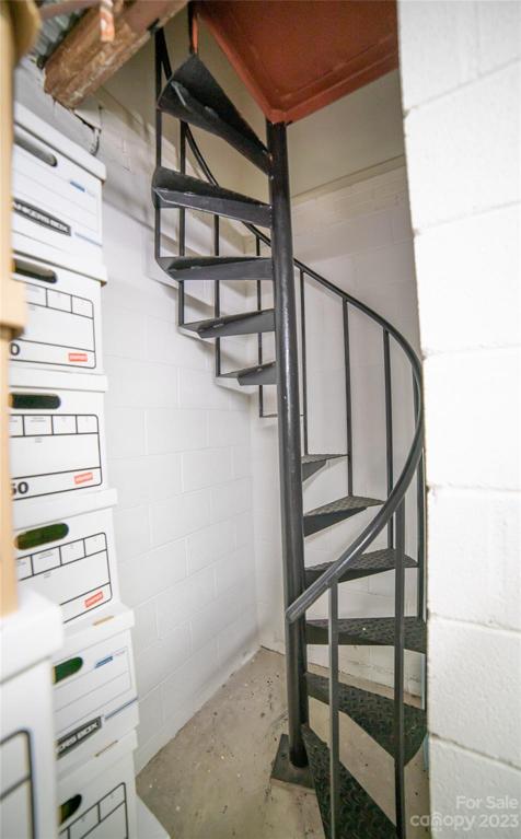 Spiral staircase to basement