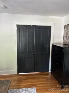 Closet doors closed between Primary bedroom and closet
