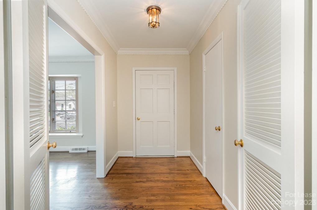 Foyer showing front door and partial LR