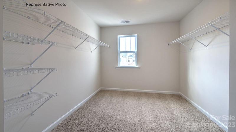 Primary walk-in closet