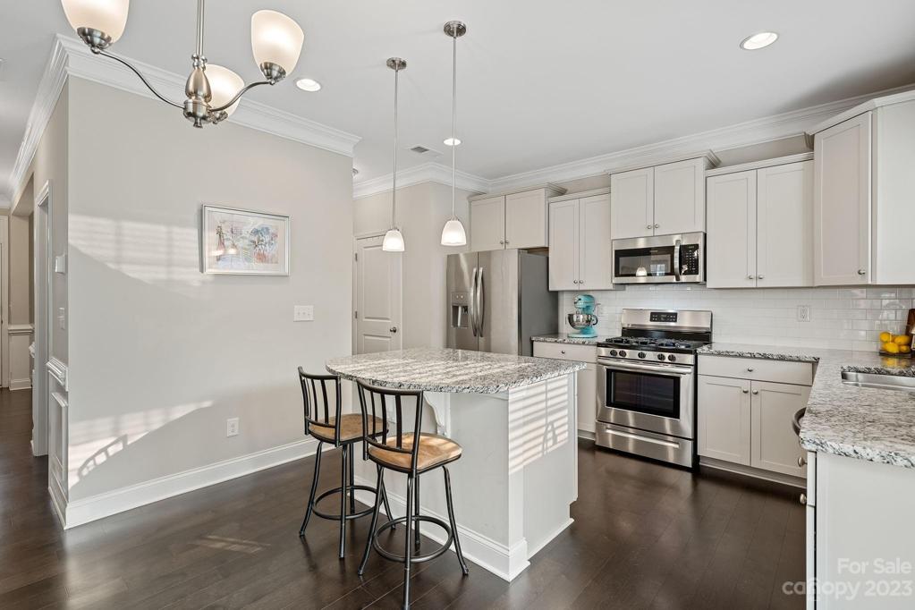 Breakfast area and island are the perfect spot for morning coffee or an afternoon snack.
