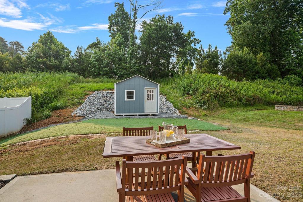 Patio table conveys with the house!  Like-New storage shed - huge upgrade!  Store all those extras or make it a playhouse!