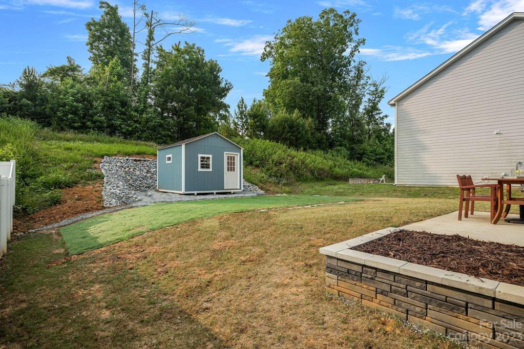 This expensive project was just completed! Like new storage shed for all the extras give you the room you need in your garage!