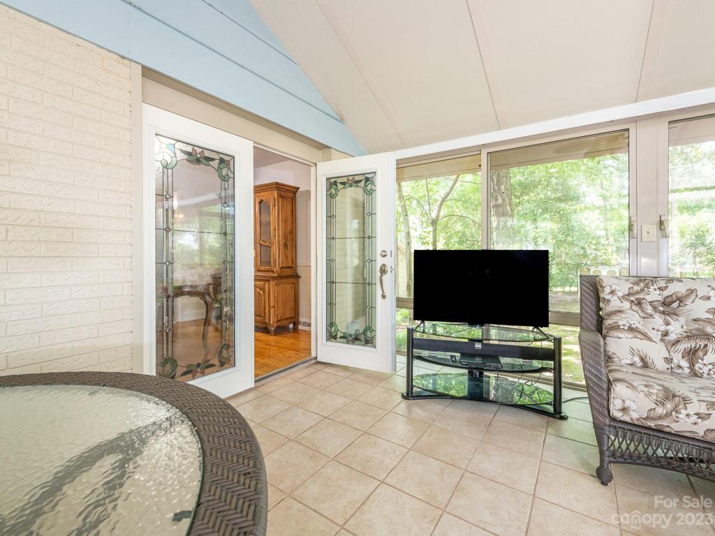 Sunroom with stained galss doors