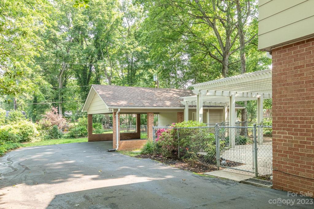 Driveway and Detached Covered Parking