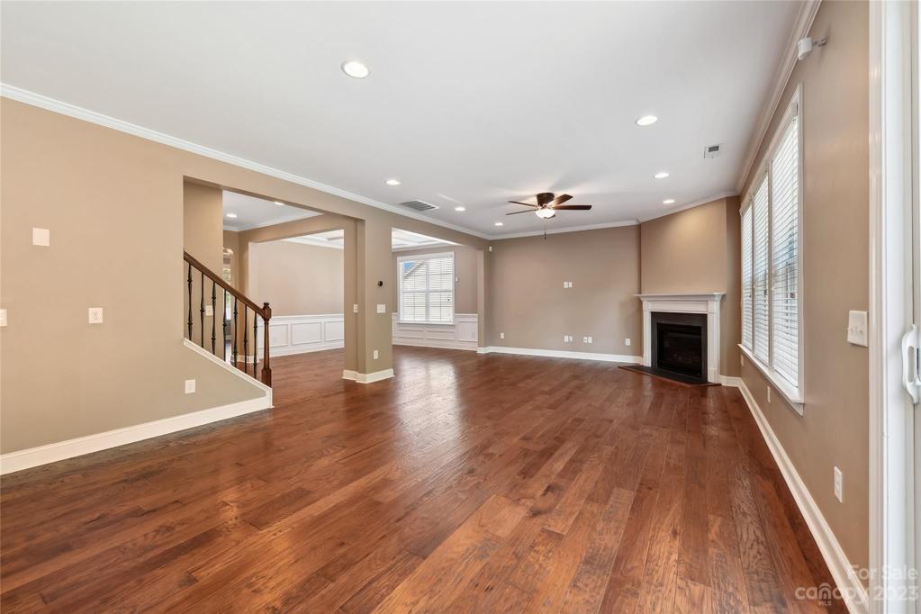 Huge Great Room With Distressed Hard Wood Floors