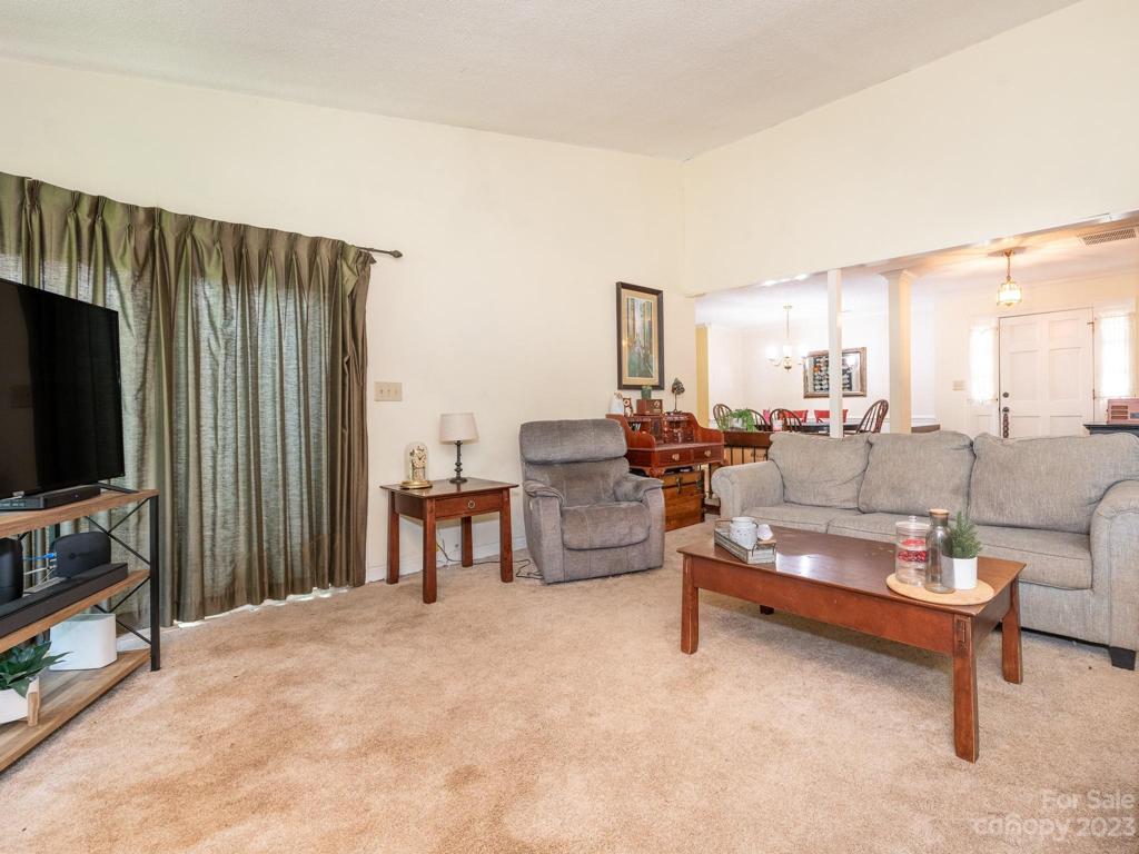 Living Room into Breakfast nook and kitchen