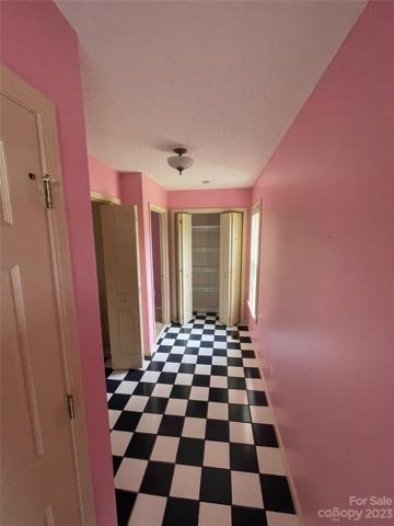 Checkerboard tile to Washer and Dryer
