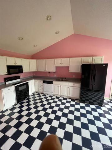 Pretty Pink Checkerboard Kitchen vaulted ceilings