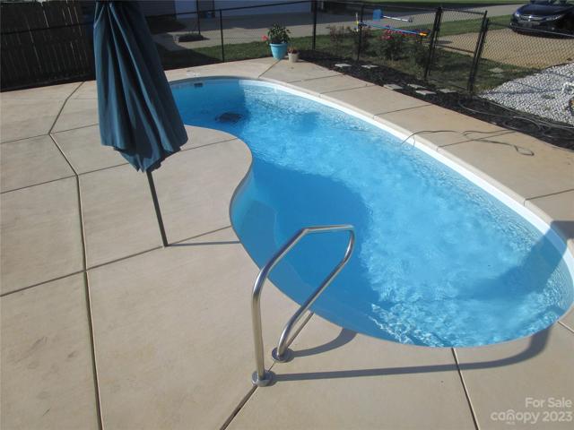 Backyard inground pool and deck