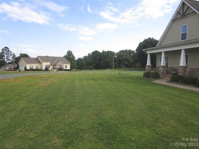 Front exterior and yard