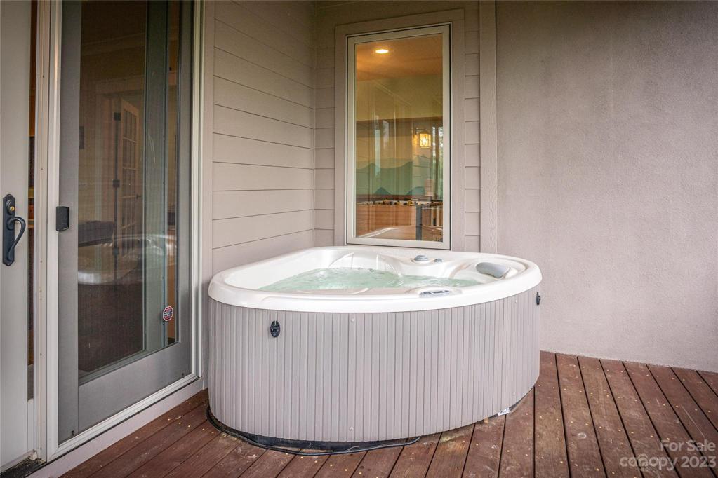 Side deck with hot tub off family room