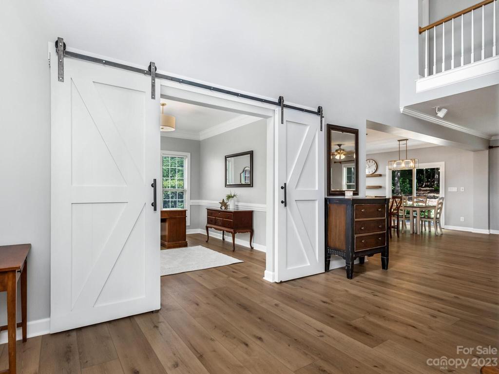 Sliding barn doors to formal dining/office