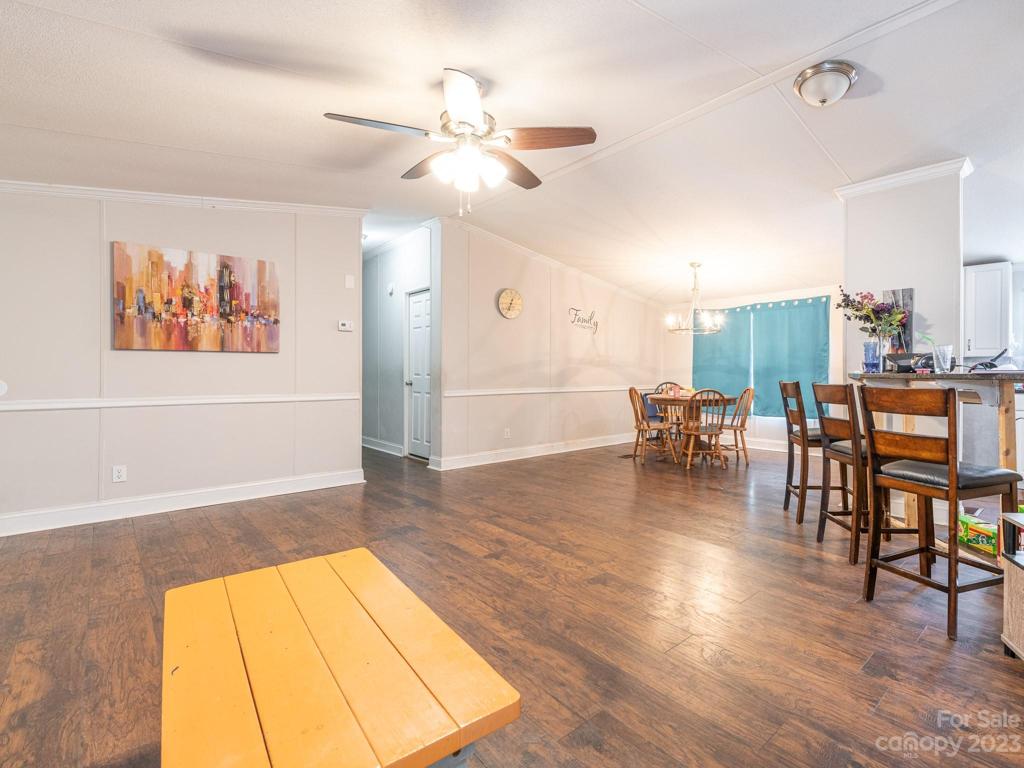 Open Living Plan to Dining Area and Kitchen Bar