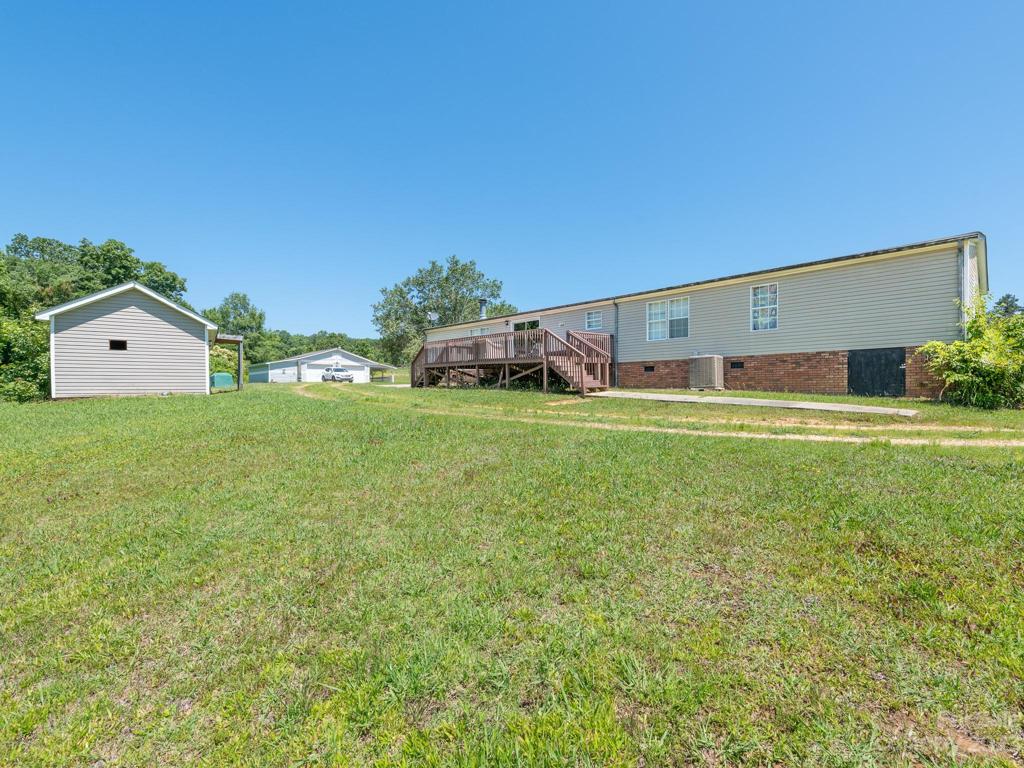 Back yard with dual storage sheds