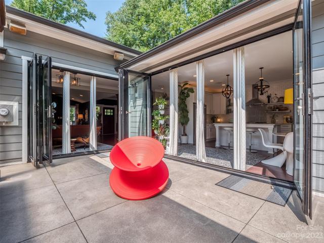 Accordian Doors Open to Amazing Outdoor Living Space with Fireplace, & Outdoor Kitchen with Natural Gas Line Run to the Grill!