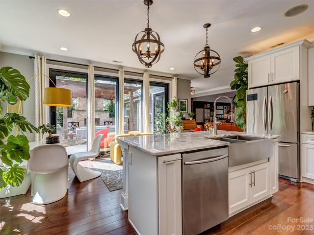 Gourmet Kitchen with Stainless Appliances, Marble Countertops, Island, Gas Cooktop, Wall Oven, Subway Tile Backsplash, Recessed Lights, Built-In Speakers and More!