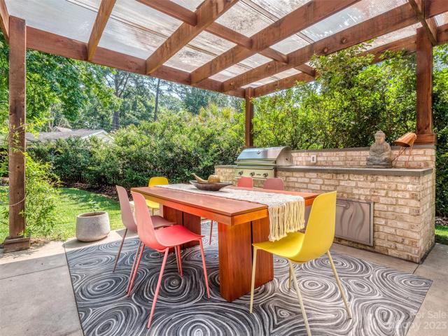 Accordian Doors Open to Amazing Outdoor Living Space with Fireplace, & Outdoor Kitchen with Natural Gas Line Run to the Grill!