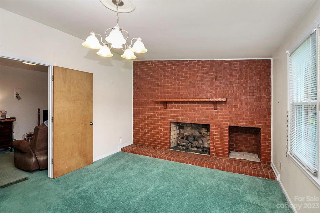 Den in the back of the house- hall outside of kitchen.