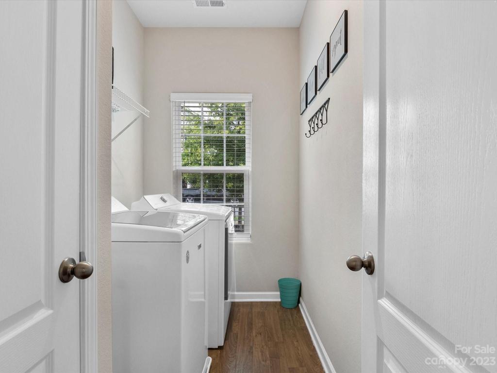 Laundry Room with spacious linen closet