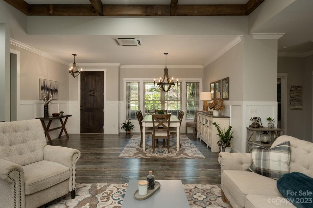 Rich crown molding throughout, Judges Paneling in dining foyer, recessed lighting, luxury waterproof flooring and tray ceilings