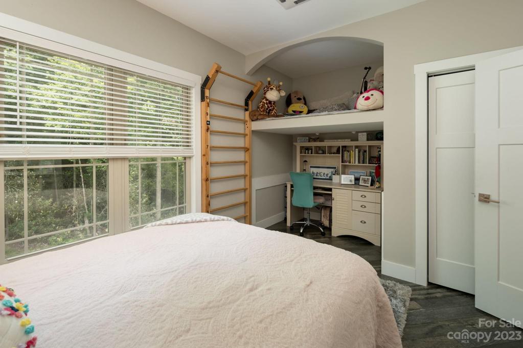 Bedroom 2 is located on the main level with charming reading/bunk nook