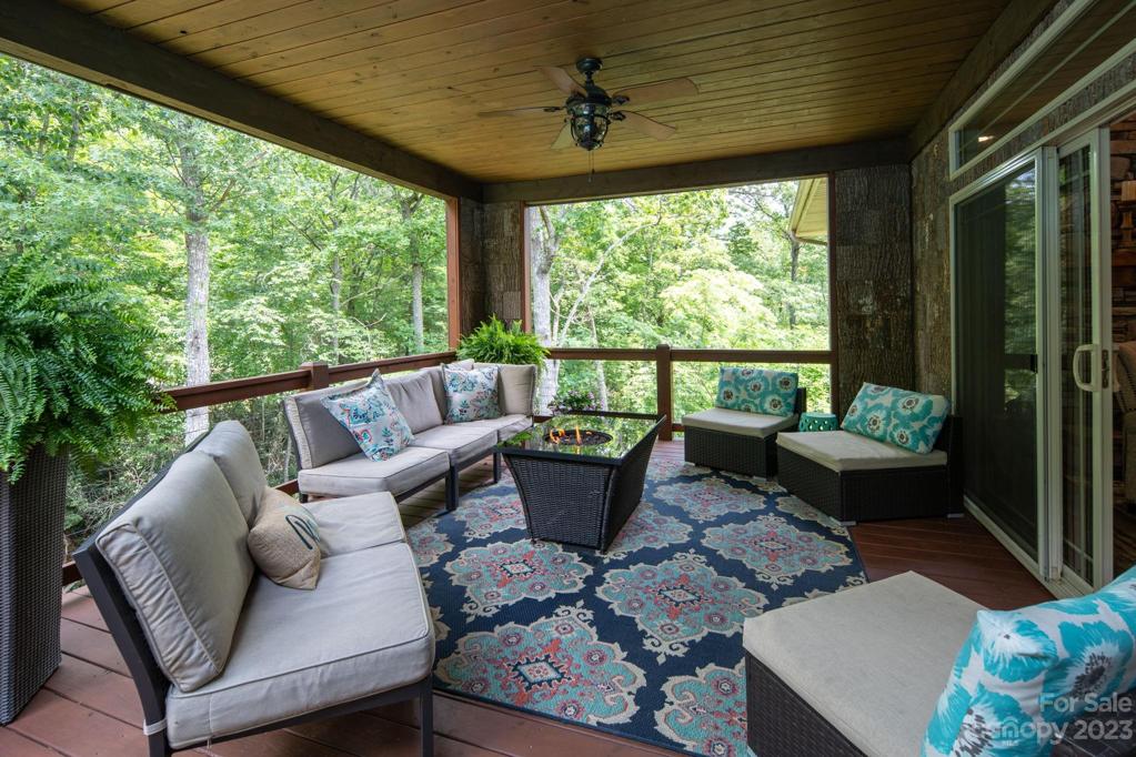 Impressive covered porch and sunny grilling deck allowing for ample privacy and extended indoor or outdoor enjoyment.