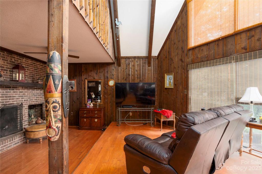 Living Room w/ vaulted ceilings