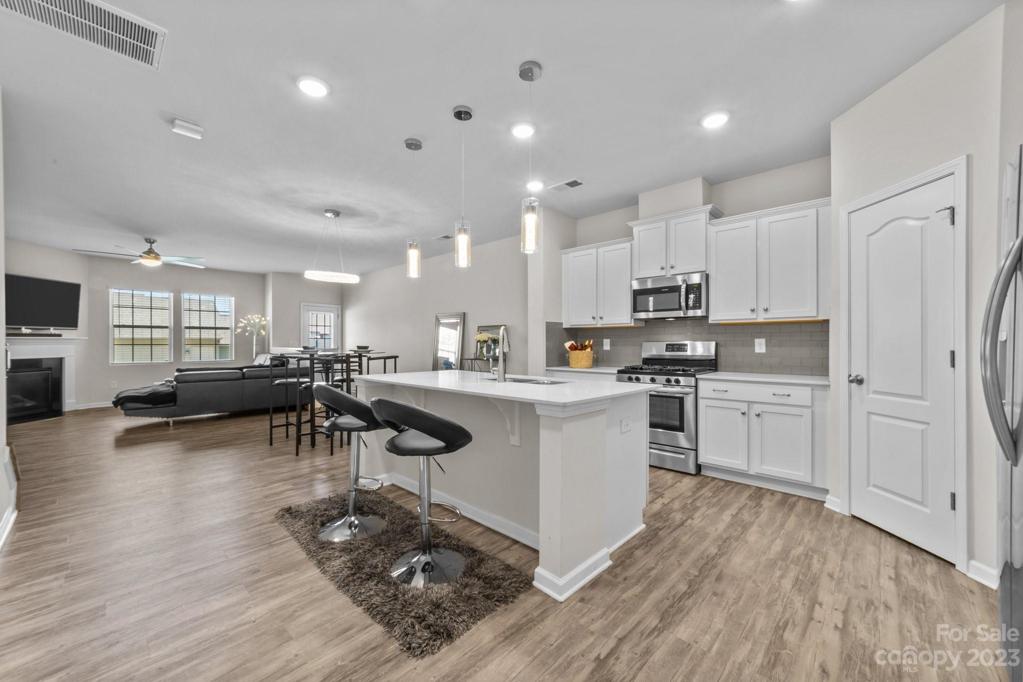 Luxury vinyl plank floor and place to entertain your friends and family!