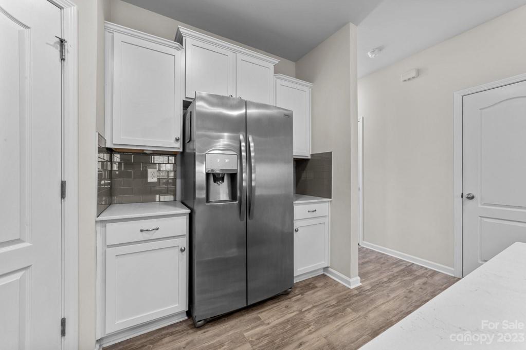 This beautiful refrigerator will convey for right offer! Stylish cabinets and plenty of closet space!