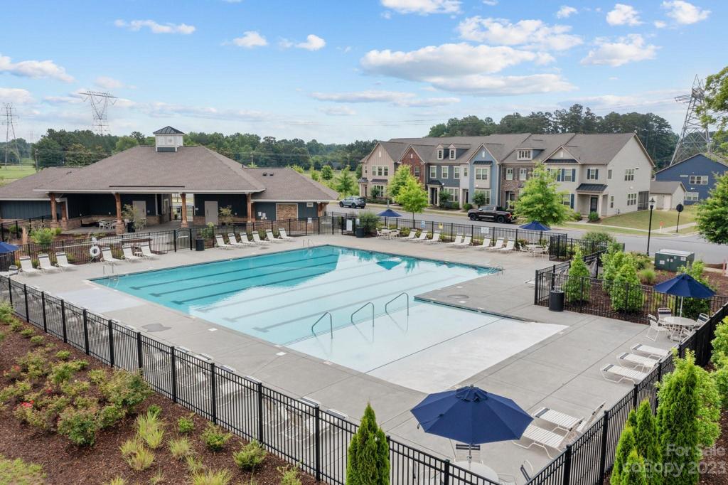 Westbranch Community Clubhouse and pool has lovely landscaping and walkways leading to the Davidson Greenway.