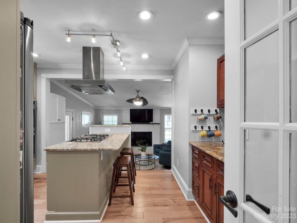 Glass door leading to kitchen
