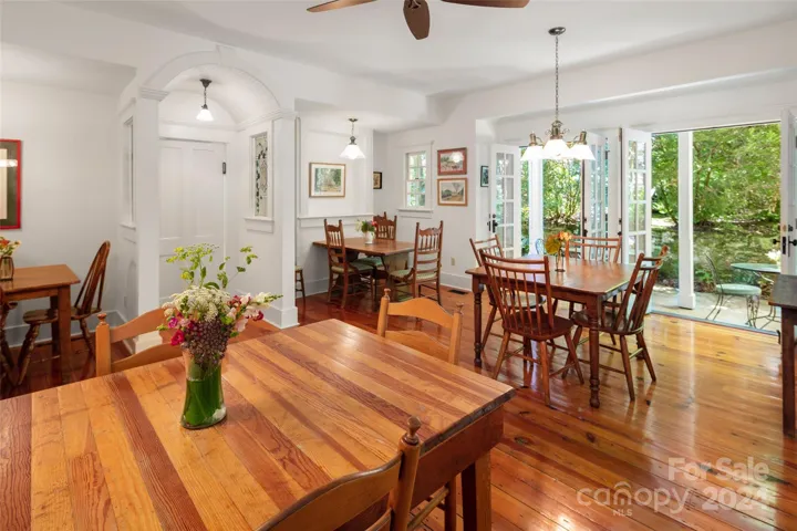 Dining room with French doors leading to outdoor patio.
