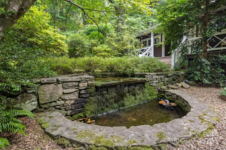 Brown Cottage with moon pond
